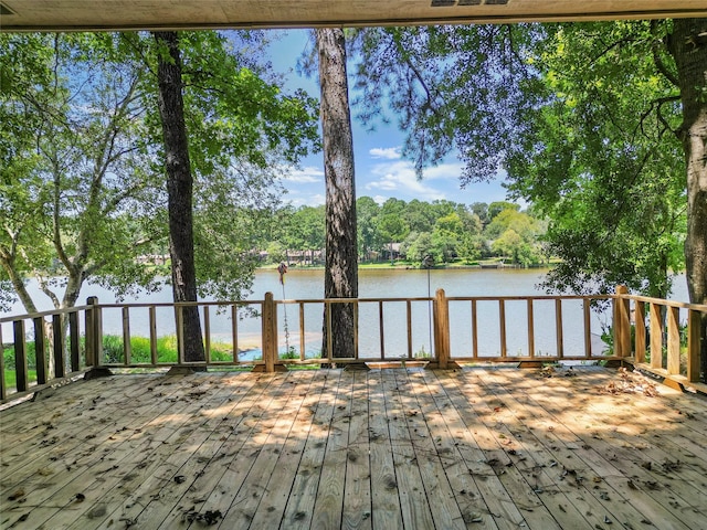 deck featuring a water view