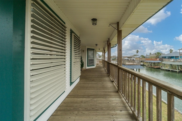 deck featuring a water view