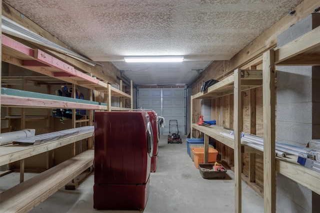 storage room featuring a garage and washer / dryer