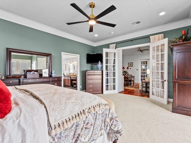 1250 Oahu Dr, Tiki Island, TX 77554 - carpeted bedroom with ornamental molding, french doors, recessed lighting, and visible vents