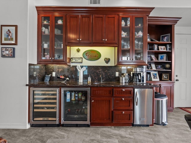 1250 Oahu Dr, Tiki Island, TX 77554 - bar with wine cooler, decorative backsplash, and indoor wet bar