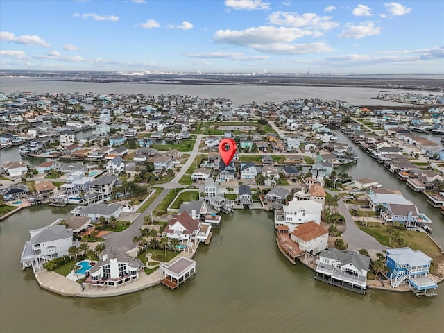 1250 Oahu Dr, Tiki Island, TX 77554 - bird's eye view with a residential view and a water view