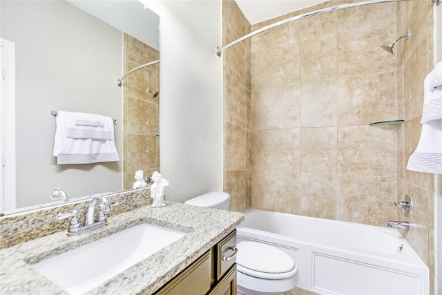 full bathroom featuring shower / bathing tub combination, vanity, and toilet