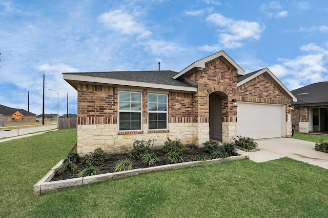 ranch-style home featuring a garage, brick siding, concrete driveway, stone siding, and a front lawn