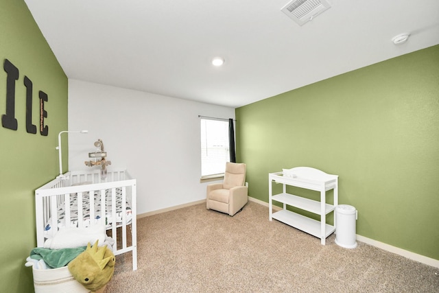 game room with light colored carpet, visible vents, and baseboards