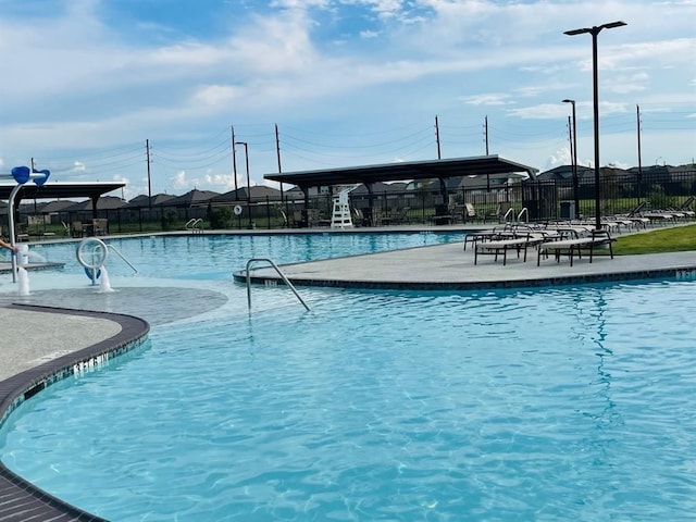 pool featuring fence