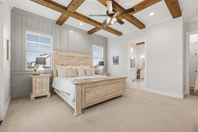 bedroom with coffered ceiling, beam ceiling, light colored carpet, and baseboards