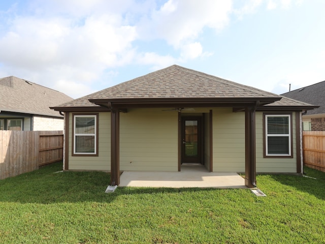 21659 Wave Hollow Dr, Cypress, TX 77433 - back of property featuring a patio area and roof with shingles
