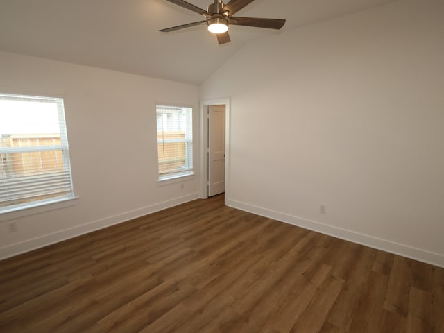 21659 Wave Hollow Dr, Cypress, TX 77433 - empty room featuring baseboards, ceiling fan, vaulted ceiling, and dark wood finished floors