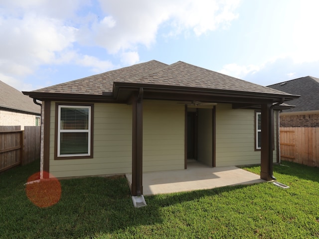21659 Wave Hollow Dr, Cypress, TX 77433 - back of property with a patio area and roof with shingles