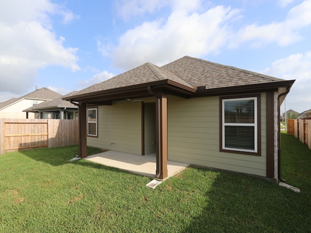 21659 Wave Hollow Dr, Cypress, TX 77433 - back of property featuring a patio and roof with shingles