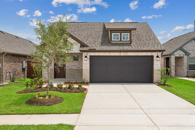 21659 Wave Hollow Dr, Cypress, TX 77433 - view of front of property featuring driveway, brick siding, a garage, a shingled roof, and a front yard