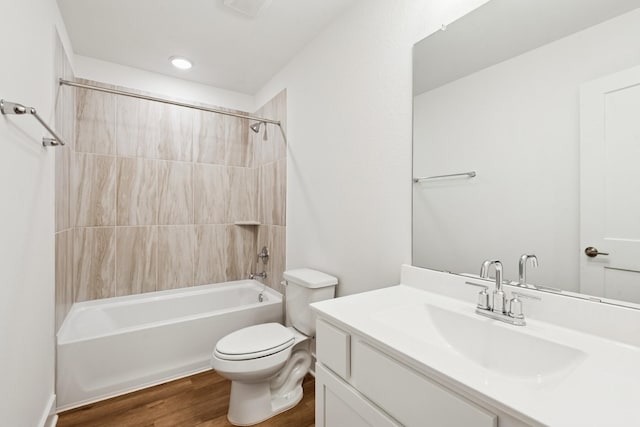 21659 Wave Hollow Dr, Cypress, TX 77433 - full bathroom featuring vanity, wood finished floors, and  shower combination