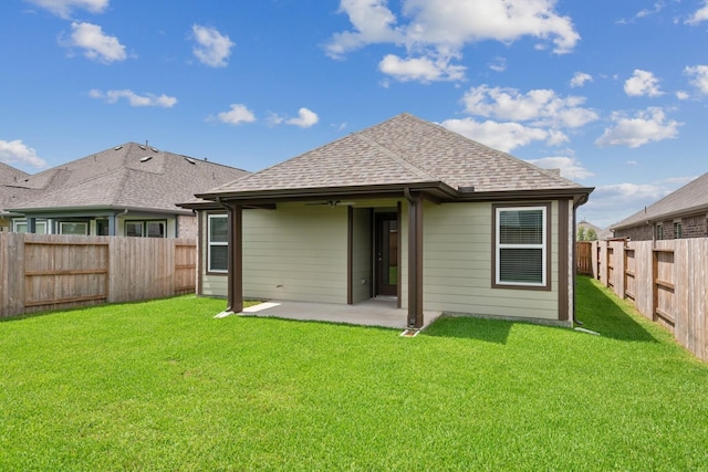 21659 Wave Hollow Dr, Cypress, TX 77433 - rear view of house featuring a fenced backyard, a patio, and a shingled roof