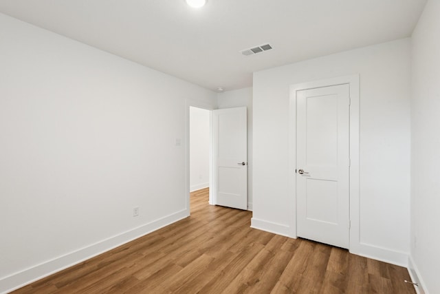 21659 Wave Hollow Dr, Cypress, TX 77433 - unfurnished bedroom with wood finished floors