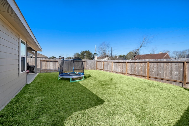 1730 Windstone Ridge Dr, Houston, TX 77014 - fenced backyard featuring a trampoline