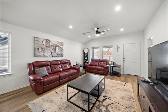 1730 Windstone Ridge Dr, Houston, TX 77014 - living room featuring a ceiling fan, light wood finished floors, recessed lighting, and lofted ceiling