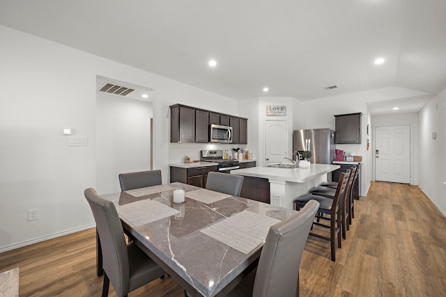 1730 Windstone Ridge Dr, Houston, TX 77014 - dining area featuring wood finished floors and recessed lighting