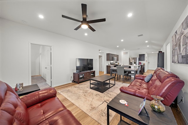 1730 Windstone Ridge Dr, Houston, TX 77014 - living area with ceiling fan, light wood-style floors, and recessed lighting