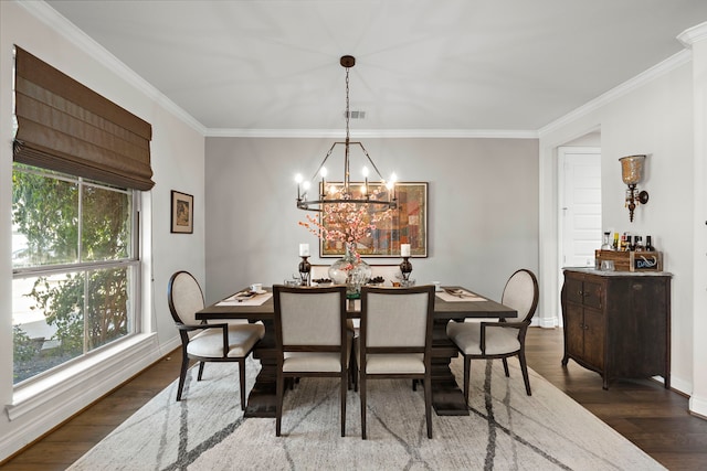 dining space featuring ornamental molding, dark wood-style flooring, visible vents, and baseboards