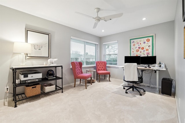 office space with recessed lighting, light colored carpet, visible vents, baseboards, and a ceiling fan