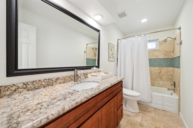 full bathroom with visible vents, shower / tub combo with curtain, vanity, and toilet