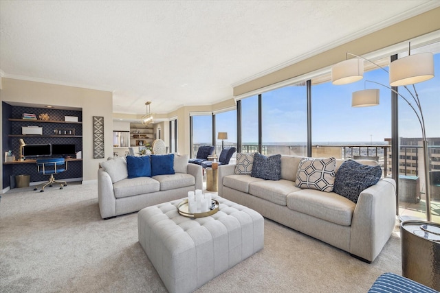 living area with ornamental molding, light colored carpet, and a textured ceiling