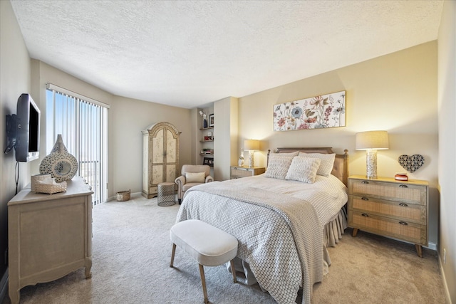 bedroom with a textured ceiling, baseboards, and light colored carpet