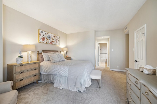 bedroom featuring light colored carpet, visible vents, and baseboards