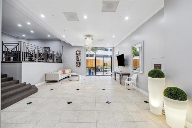 living room featuring recessed lighting, crown molding, baseboards, and light tile patterned floors