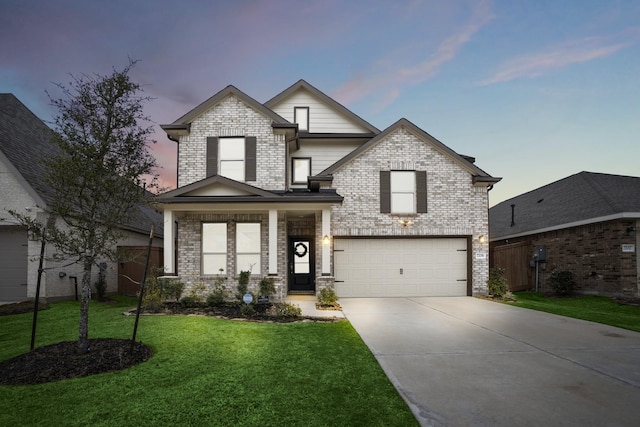 view of front of property featuring brick siding, a yard, concrete driveway, fence, and a garage