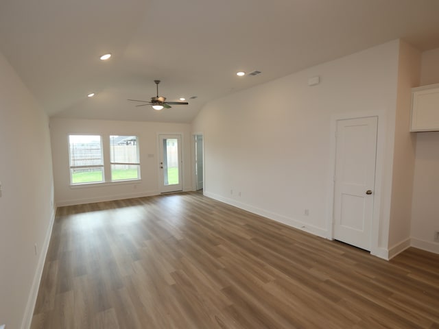 8022 Kay Harbor Dr, Cypress, TX 77433 - spare room with a ceiling fan, wood finished floors, baseboards, vaulted ceiling, and recessed lighting