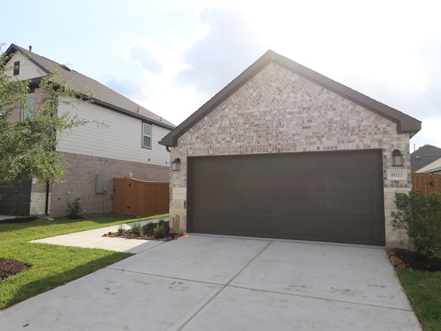 8022 Kay Harbor Dr, Cypress, TX 77433 - view of front of house with driveway, brick siding, and a garage
