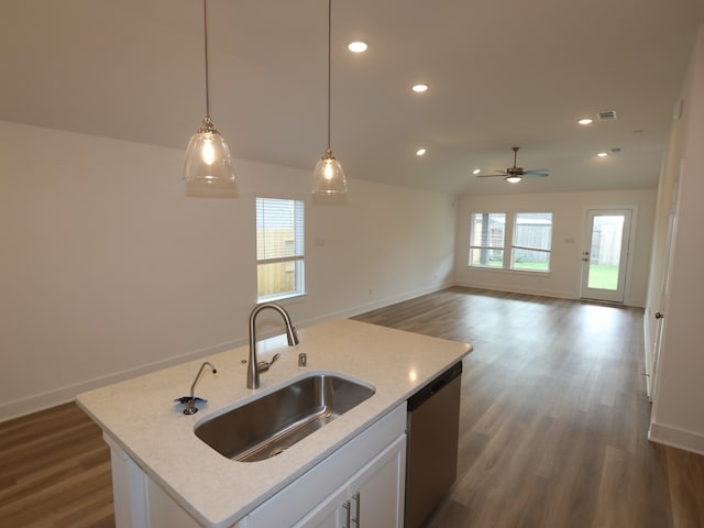 8022 Kay Harbor Dr, Cypress, TX 77433 - kitchen featuring a sink, dishwasher, dark wood finished floors, an island with sink, and recessed lighting