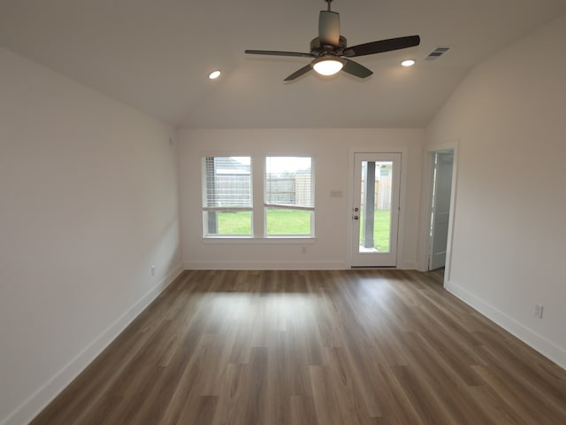8022 Kay Harbor Dr, Cypress, TX 77433 - empty room with lofted ceiling, baseboards, wood finished floors, ceiling fan, and recessed lighting