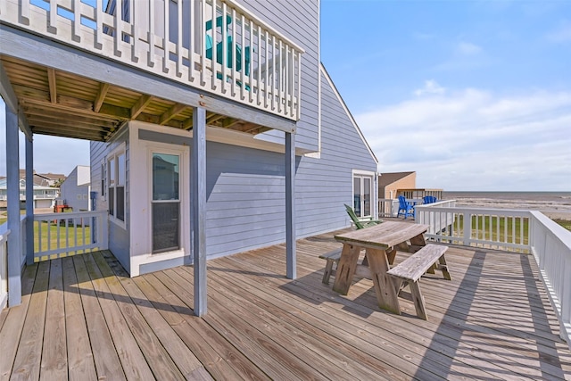 wooden deck featuring outdoor dining space