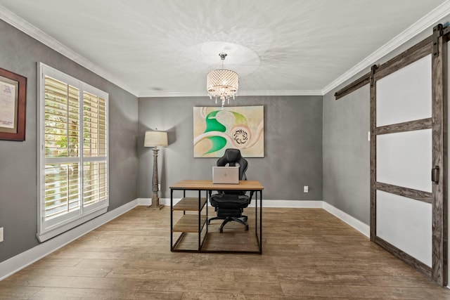 home office with a barn door, baseboards, wood finished floors, an inviting chandelier, and crown molding