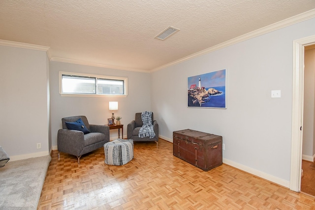 living area featuring visible vents, crown molding, a textured ceiling, and baseboards