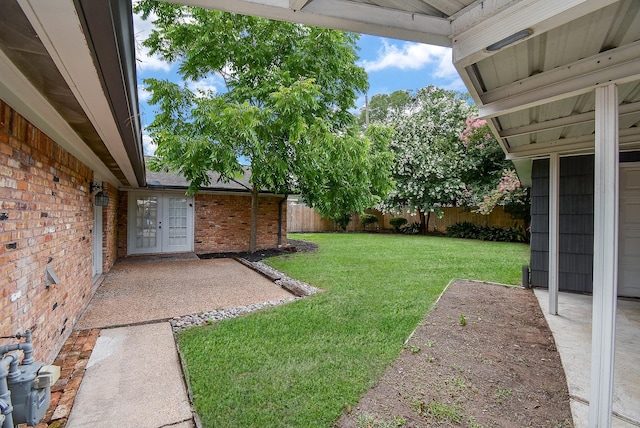 view of yard featuring a patio area and fence