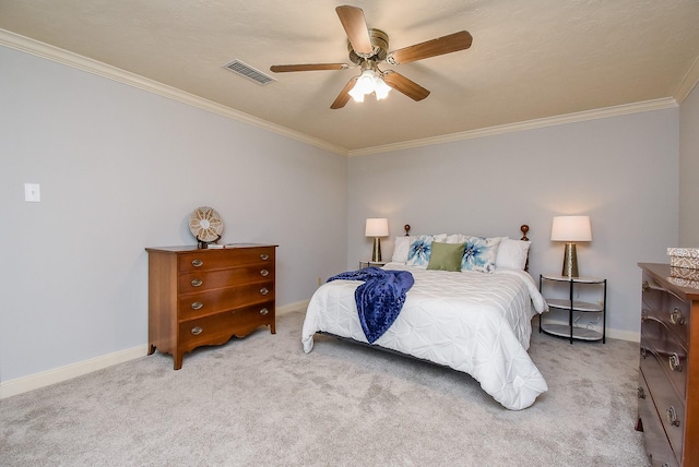 bedroom featuring light carpet, baseboards, visible vents, and crown molding