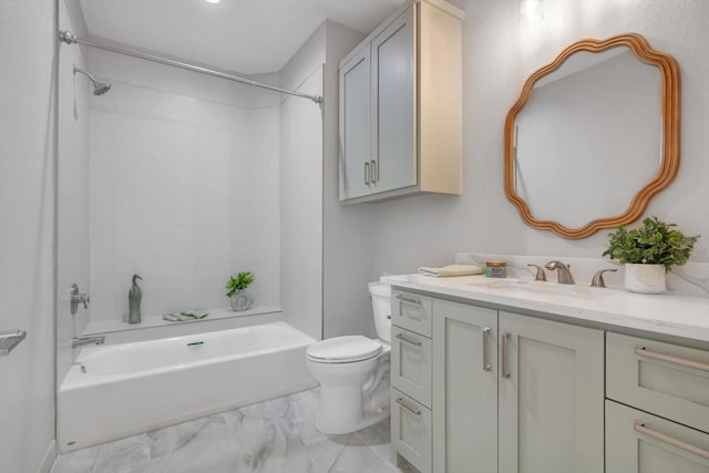 full bathroom featuring marble finish floor, bathtub / shower combination, vanity, and toilet