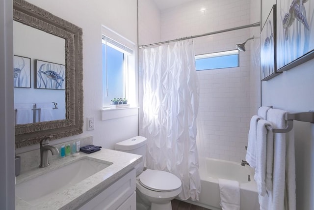 bathroom with toilet, shower / bath combination with curtain, and vanity