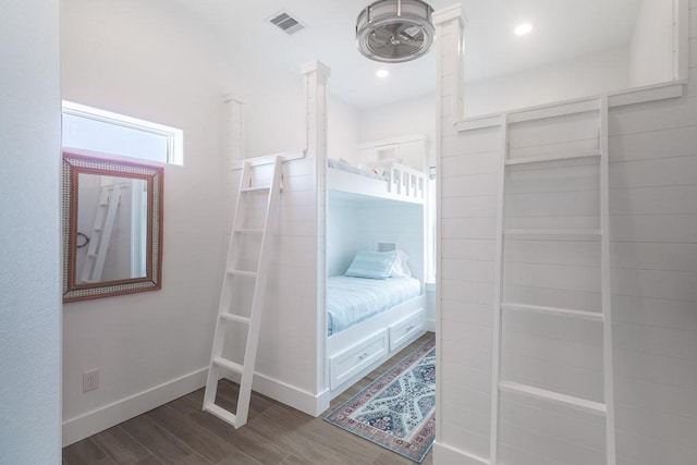 bedroom featuring recessed lighting, wood finished floors, visible vents, and baseboards