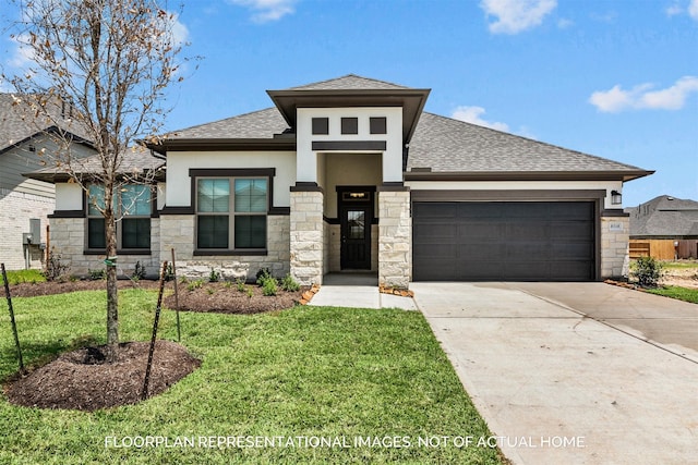 prairie-style home featuring a garage, driveway, roof with shingles, and a front yard