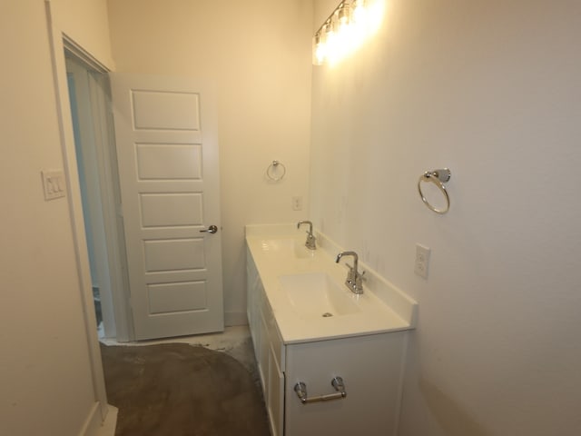 8311 Oceanmist Cove Dr, Cypress, TX 77433 - bathroom featuring baseboards and double vanity