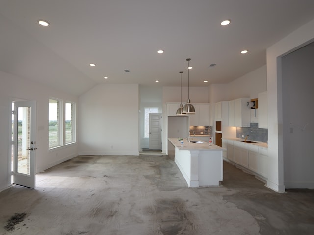 8311 Oceanmist Cove Dr, Cypress, TX 77433 - kitchen with a sink, recessed lighting, an island with sink, decorative backsplash, and white cabinets