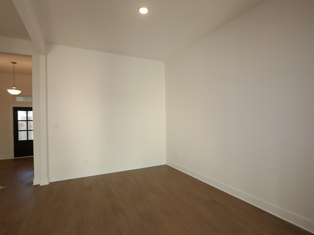 8311 Oceanmist Cove Dr, Cypress, TX 77433 - empty room with dark wood-style flooring, baseboards, and recessed lighting