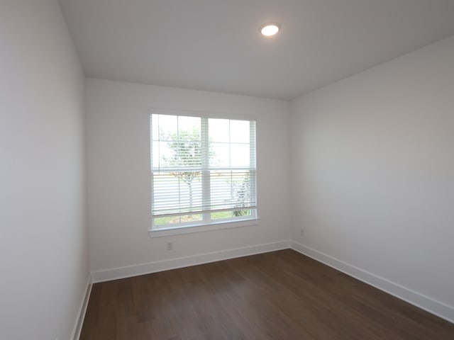 8311 Oceanmist Cove Dr, Cypress, TX 77433 - empty room featuring dark wood finished floors, baseboards, and recessed lighting