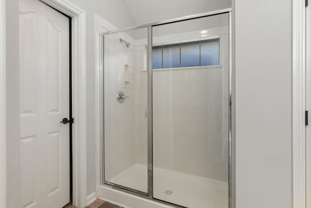 full bathroom with a stall shower