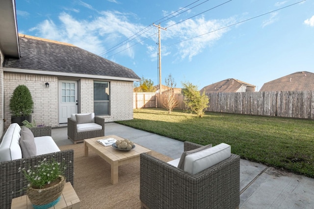 view of patio / terrace with a fenced backyard and an outdoor living space